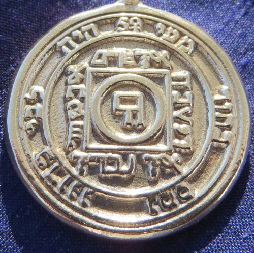 Talisman larger than actual size